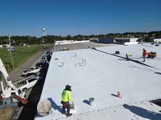 Commercial Flat Roof Coating Installation